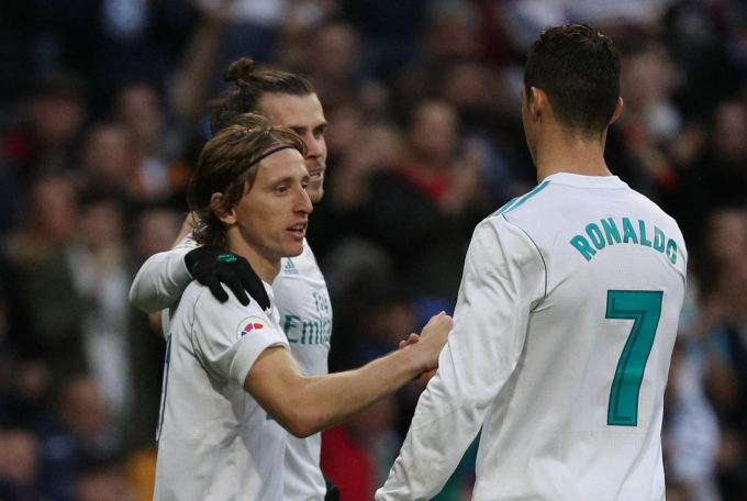 Ronaldo và Modric trong những năm tháng còn khoác áo Real. Ảnh: Reuters