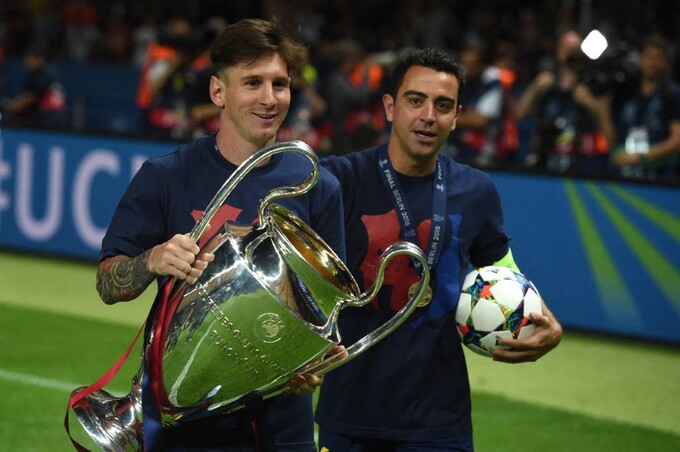 Xavi (phải) và Messi ăn mừng sau khi Barca thắng Juventus 3-1 ở chung kết Champions League trên sân Olympic, Berlin ngày 6/6/2015. Ảnh: AFP